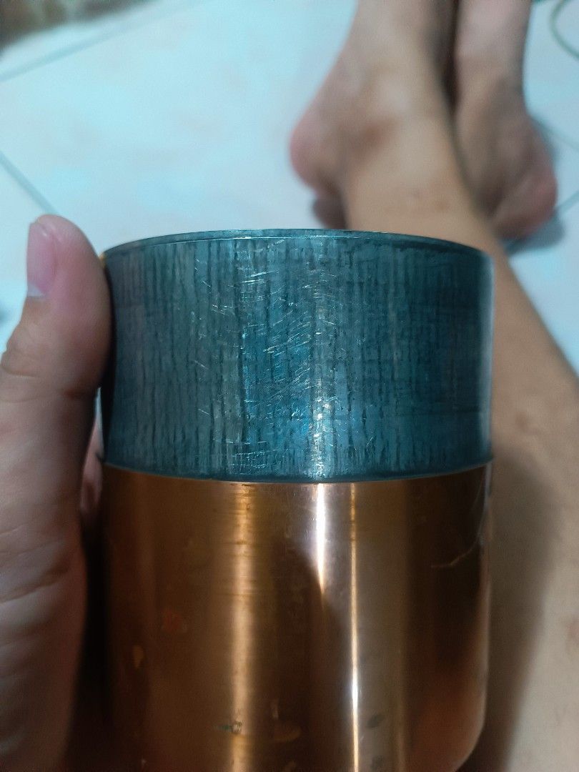 2000 Millennium copper tea caddy container storage jar (Category: Food Organization & Storage) located in Manila. Submitted by mateochest99469 (Listing ID 1468912073, Image 2). Description: - Vintage copper tea caddy with 2000 Millennium stamp and Chinese characters - Features a secure inner lid with a top knob - Base includes an authentic Chinese hallmark - Displays natural surface wear, scratches, and beautiful aged patina - Great collectible p