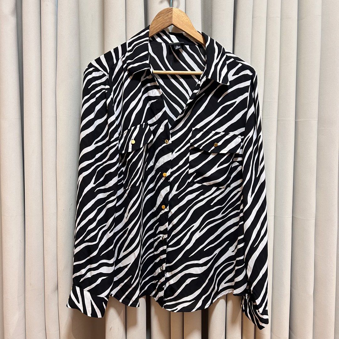 2XL Zebra Print Longsleeves (Category: Longsleeves) located in Rizal. Submitted by from99abovecloset (Listing ID 1468824784, Image 1). Description: CODE:195 Size: XL-2XL Armhole (laid flat):11” Bust (around): 48” Length (laid flat): 29” Soft poly | loose | like new.