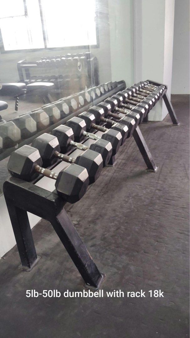 5lb-50lb Hex Dumbbell Set with Heavy Duty Rack (Category: Weights & Dumbbells) located in Pasig City. Submitted by rhi-stock (Listing ID 1468777801, Image 2). Description: - Complete set: Rubber hex dumbbells ranging from 5lb to 50lb - Includes a sturdy, two-tier black metal storage rack - Ergonomic handles featuring a firm knurled grip - Condition: Normal wear and tear on metal and rubber surfaces from regular gym use - Ideal and durable setup f