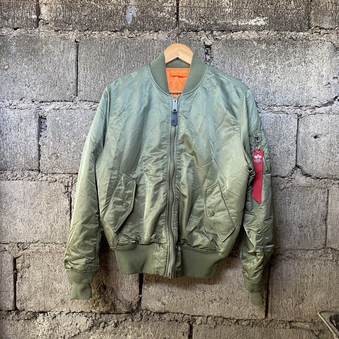 90s Alpha Industries Flight Man Jacket (Category: Coats, Jackets and Outerwear) located in Cabanatuan. Submitted by elijahthriftv2 (Listing ID 1468820304, Image 1). Description: Width 22.5 Lenght 26 Authentic No issue.