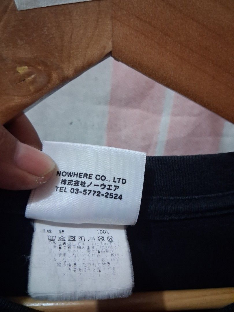 A Bathing Ape BAPE Moon Graphic Tee (Category: Tshirts & Polo Shirts ) located in Tarlac. Submitted by dwaynebarr31837 (Listing ID 1468822542, Image 3). Description: - Brand: BAPE (Nowhere Co., Ltd) - Color: Black - Size: Medium - Design: Large moon graphic on chest, signature ape head tag on sleeve - Material: 100% Cotton - Origin: Made in Japan - Condition: Clean, excellent overall condition.