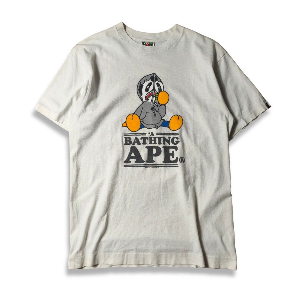 A Bathing Ape Shark Panda Graphic Tee Size M (Category: Formal Shirts) located in Butuan. Submitted by prince0922 (Listing ID 1468733533, Image 1). Description: Bape Panda OG M Size on tag: M Width: 20 Length: 28 Very Good Condition Issue: Minimal HL, graph fade Color Rate: 9.3/10 Price: 1300📥.