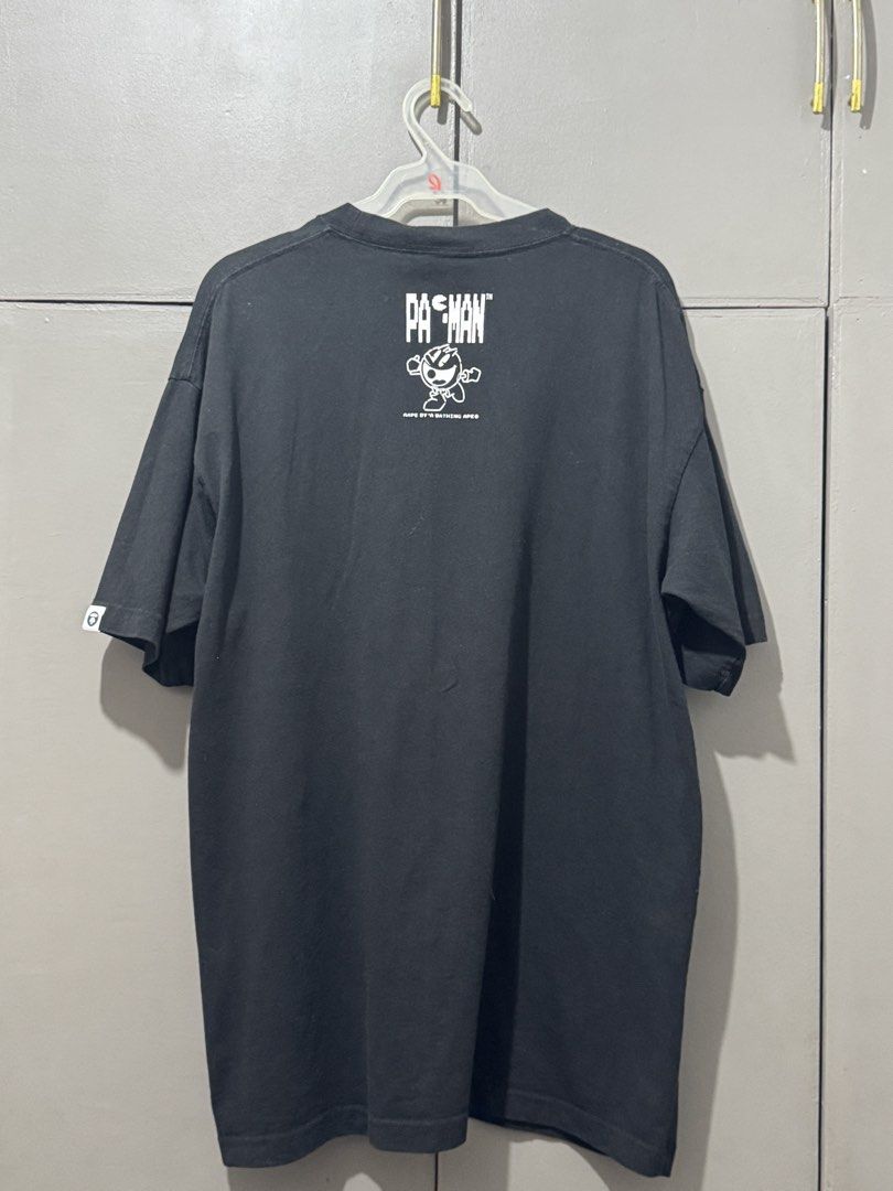 Aape x Pacman Tee (Category: Tshirts & Polo Shirts ) located in Imus. Submitted by nthnllll (Listing ID 1468755897, Image 2). Description: FOR SALE AAPE x Pac-man shirt Authentic | Approved💯 800 ONLY Size: L fits XL oversize fitting Dimes: W23 x L30 Condition: 9.5/10 Minimal Crack Print only Item is already washed, susuotin na lang🔥 Can provide detailed photos upon request Shipping to be shouldered by buyer Lalamove | JNT | LBC | Grab Express �