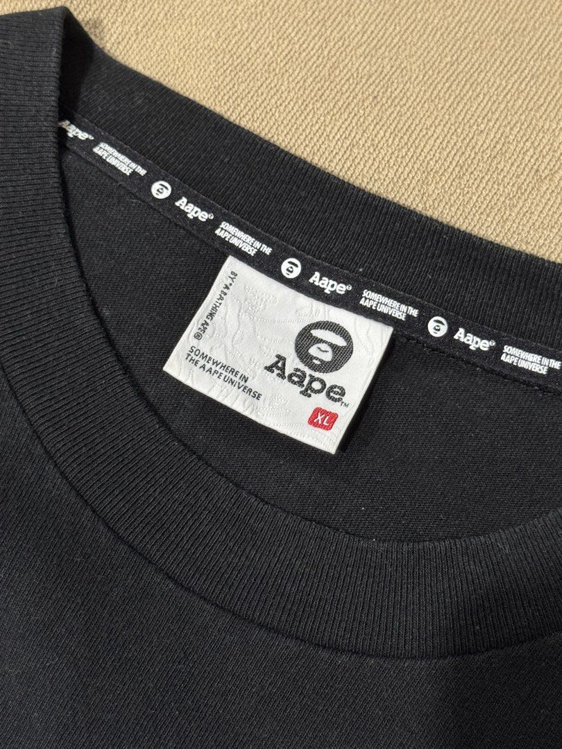 Aape x Pacman Tee (Category: Tshirts & Polo Shirts ) located in Imus. Submitted by nthnllll (Listing ID 1468755897, Image 3). Description: FOR SALE AAPE x Pac-man shirt Authentic | Approved💯 800 ONLY Size: L fits XL oversize fitting Dimes: W23 x L30 Condition: 9.5/10 Minimal Crack Print only Item is already washed, susuotin na lang🔥 Can provide detailed photos upon request Shipping to be shouldered by buyer Lalamove | JNT | LBC | Grab Express �