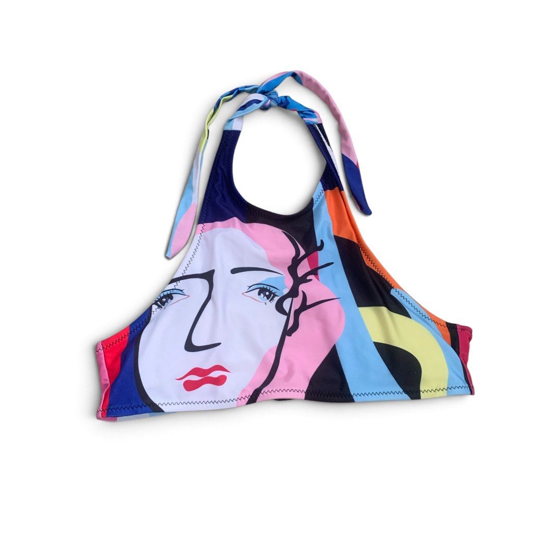 Abstract Art Face Halter Bikini Top (Category: Bikinis & Swimsuits) located in Manila. Submitted by thriftnivee (Listing ID 1468888209, Image 1). Description: - Style: Halter bikini top with a bold abstract face graphic - Colors: Striking pink, blue, yellow, and black color block - Fit & Features: High neck cut with adjustable tie straps - Material: Stretchy swimwear fabric with zig-zag stitching on the bottom hem - Perfect for: Beach days, pool 