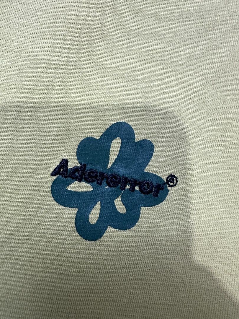 Ader Error Front Embroi. Logo & Floral Back Design Tee (Category: Tshirts & Polo Shirts ) located in San Fernando. Submitted by jazzclosetest2018 (Listing ID 1468788836, Image 3). Description: My Location: San Fernando, Pampanga📍 Payment 1st Transaction! Ader Error Front Embroi. Logo & Floral Back Design Tee Size: A1 (On Tag) Small up to Medium Fit L26" * W18.5" Excellent Condition Legit/Authentic ₱ 450.00 + SF.