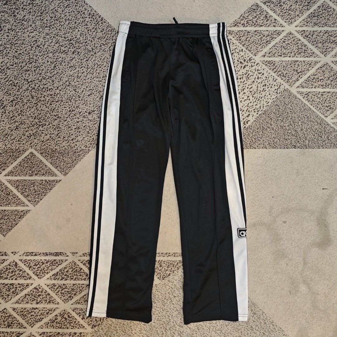 Adidas Adibreak Track Pants (Category: Joggers) located in Tanay. Submitted by polothriftedit (Listing ID 1468864935, Image 1). Description: No issue Excellent condition Color rate: 10/10 has waist laces No loose stitches, no distressing dimes: waist: 28"-36" total length: 38.5" inseam: 29.5" thigh: 12" hem: 8.5" no return, no exchange, no refund [ pwede tumawad kahit walang kasalanan ].