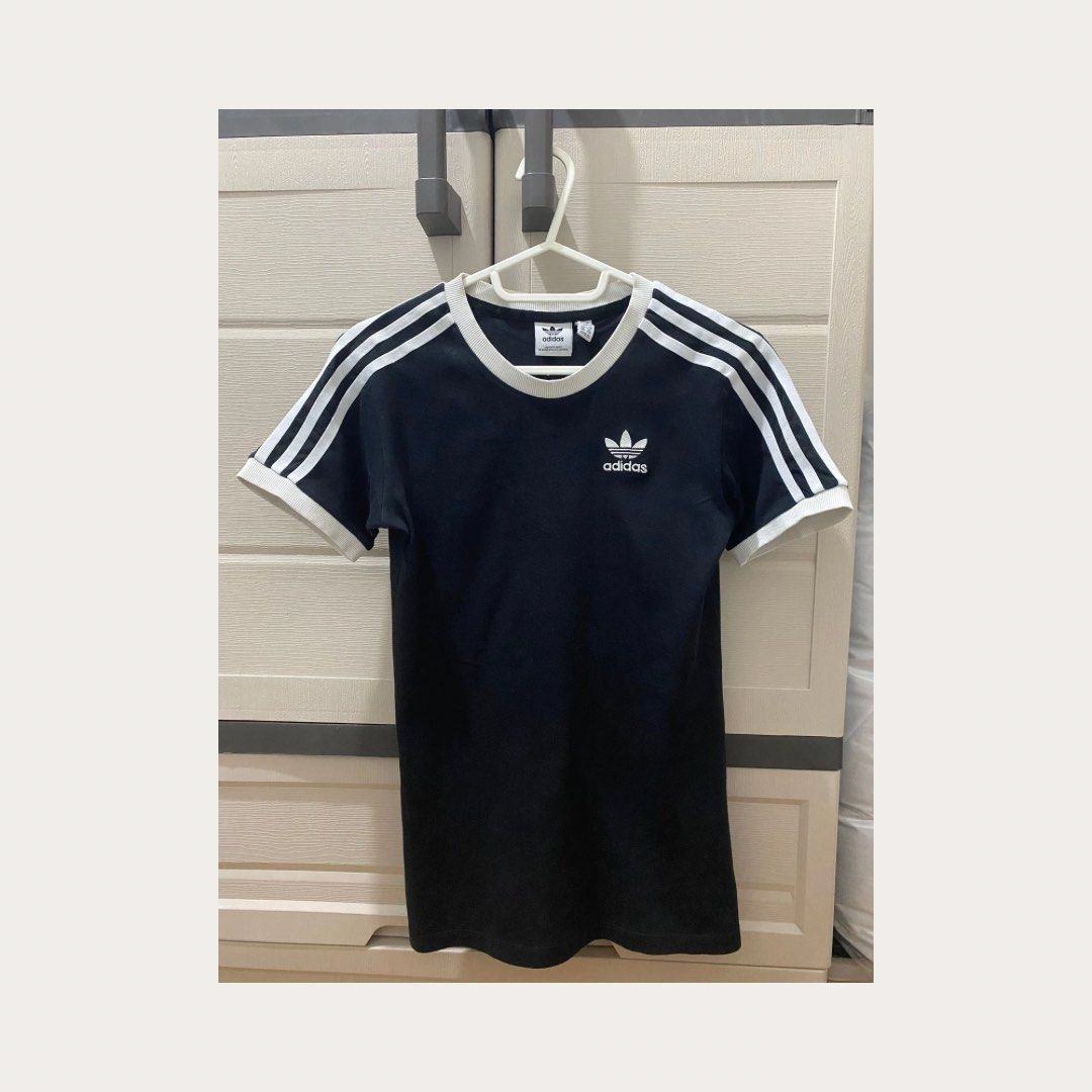 ADIDAS: ADICOLOR CLASSICS SLIM 3-STRIPES TEE (Category: Shirts) located in Manila. Submitted by reinegnvv (Listing ID 1468795337, Image 2). Description: ADIDAS: ADICOLOR CLASSICS SLIM 3-STRIPES TEE ✅ Like New ✅ Bought from The Outlet Store Riverbanks (Marikina) Size: XS - Slim Fit - Ribbed crewneck - 100% cotton - Ribbed cuffs - Color: Black A SLIM-FIT TEE FOR EFFORTLESS STYLE AND MAXIMUM COMFORT. This adidas tee pairs classic 3-Stripes style wit
