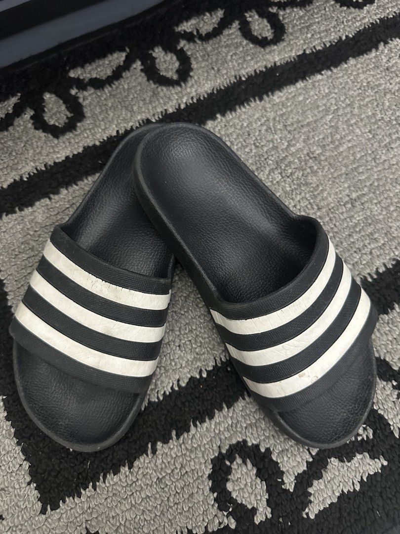 Adidas Adilette Aqua Slides (Category: Babies & Kids Fashion) located in Quezon City. Submitted by realdealfinds (Listing ID 1468797651, Image 2). Description: Well used Not an everyday used Size: 4US UK3 .
