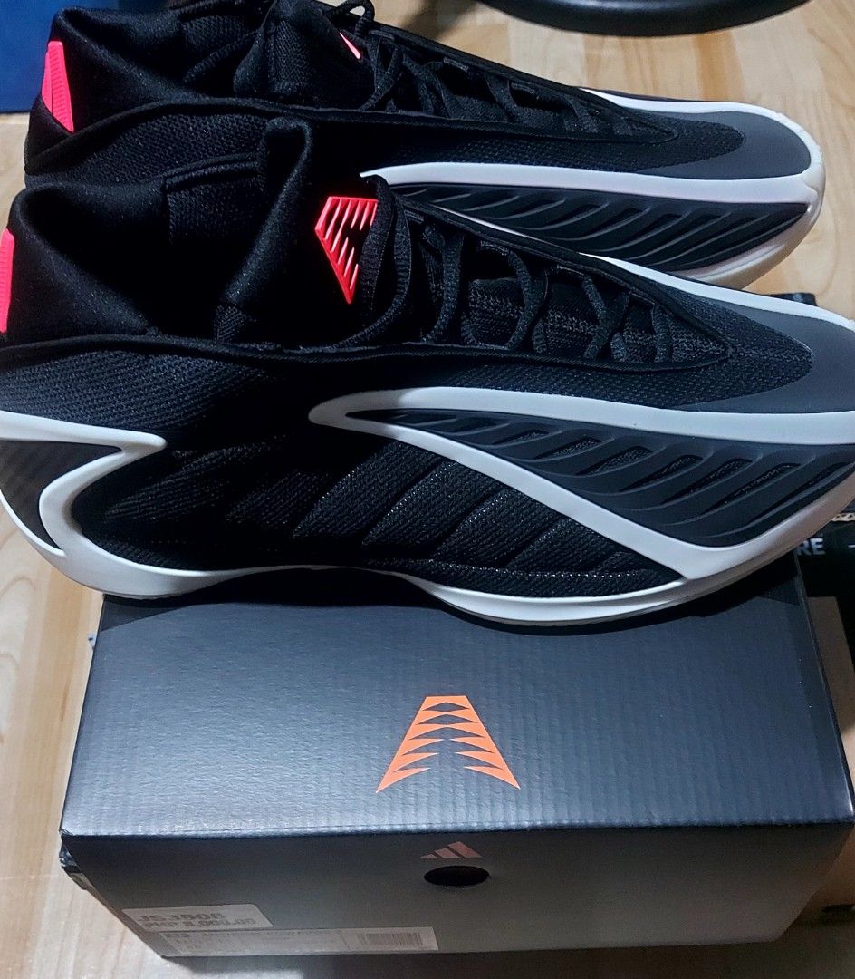 Adidas Anthony Edwards 2 With Extra Laces (Category: Sneakers) located in Taguig. Submitted by minhawon (Listing ID 1468818045, Image 3). Description: - Brand: Adidas Anthony Edwards Signature Basketball Shoes - Colorway: Black and white with vibrant coral red accents - Condition: Clean, soles feature pink traction pattern, ready to play - Inclusions: Original box and extra set of bright red laces - Perfect for on-court performance or casual wear