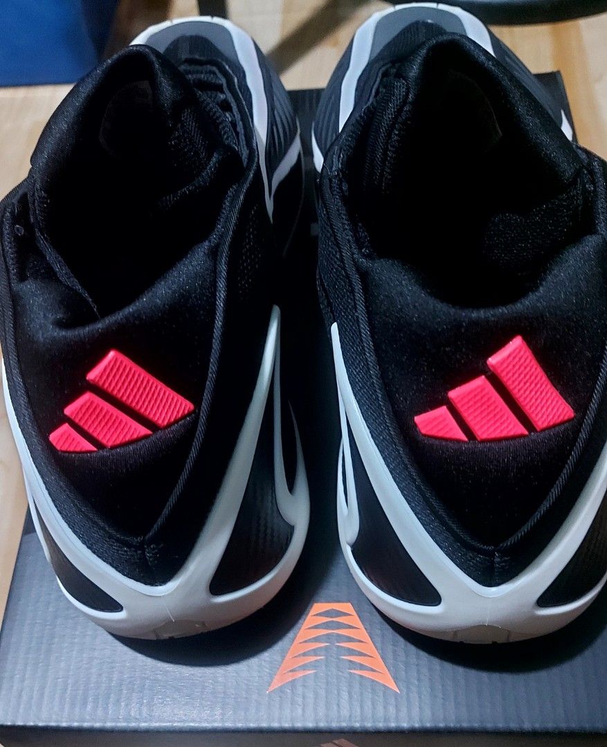 Adidas Anthony Edwards 2 With Extra Laces (Category: Sneakers) located in Taguig. Submitted by minhawon (Listing ID 1468818045, Image 2). Description: - Brand: Adidas Anthony Edwards Signature Basketball Shoes - Colorway: Black and white with vibrant coral red accents - Condition: Clean, soles feature pink traction pattern, ready to play - Inclusions: Original box and extra set of bright red laces - Perfect for on-court performance or casual wear