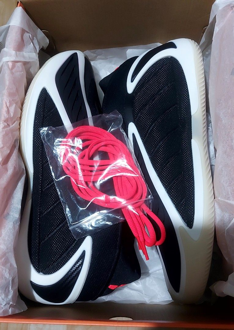 Adidas Anthony Edwards 2 With Extra Laces (Category: Sneakers) located in Taguig. Submitted by minhawon (Listing ID 1468818045, Image 1). Description: - Brand: Adidas Anthony Edwards Signature Basketball Shoes - Colorway: Black and white with vibrant coral red accents - Condition: Clean, soles feature pink traction pattern, ready to play - Inclusions: Original box and extra set of bright red laces - Perfect for on-court performance or casual wear