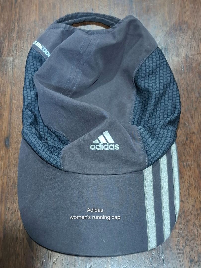 ADIDAS Women’s Running Cap (Category: Hats & Beanies) located in Pasig City. Submitted by dripcounty (Listing ID 1468816157, Image 1). Description: ADIDAS Women’s Running Cap ₱350 Bought in the Philippines Size: Unconfirmed Condition: Good / preloved; wear visible on the printed logo. ClimaCool mesh panels and three-stripe brim. Actual item shown in photos. Delivery fee shouldered by buyer (Lalamove / other courier). Item price excludes delivery.