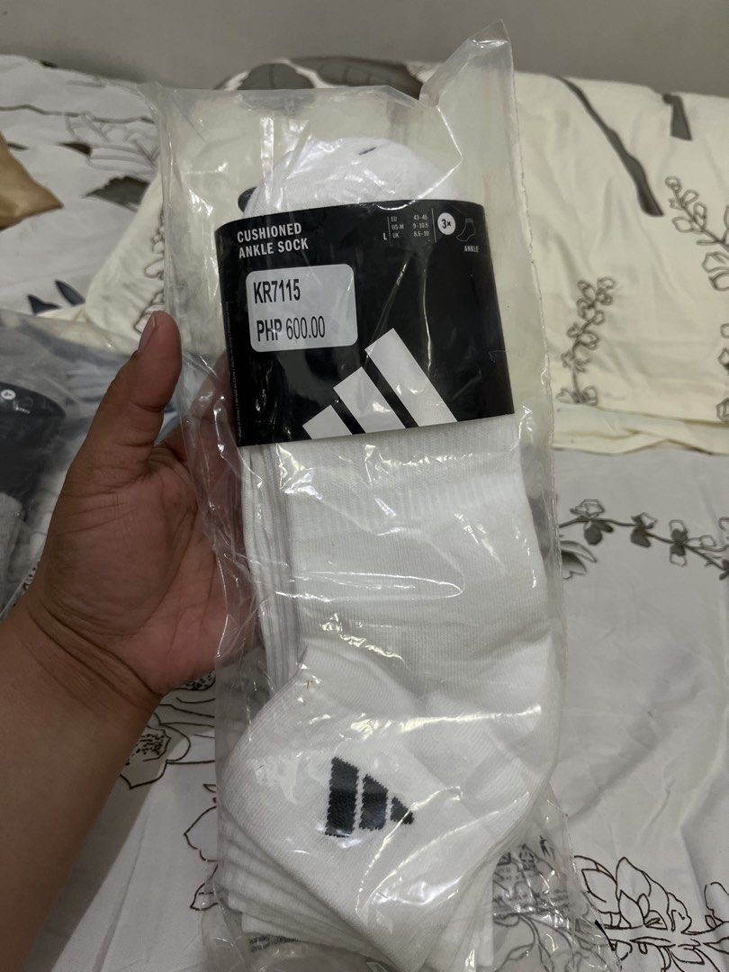 Adidas Original Cushioned Ankle Socks White Size L (Category: Socks) located in Cebu City. Submitted by iamgee89 (Listing ID 1468759367, Image 1). Description: - Brand: Adidas - Item: Cushioned ankle socks - Color: White - Quantity: Pack of 3 pairs - Size: L (fits EU 43-45 or US M 9-10.5) - Condition: Brand new, sealed in original plastic packaging with tags attached - Selling very low - RFS: Got a wrong size Guaranteed Original Adidas Socks Loca