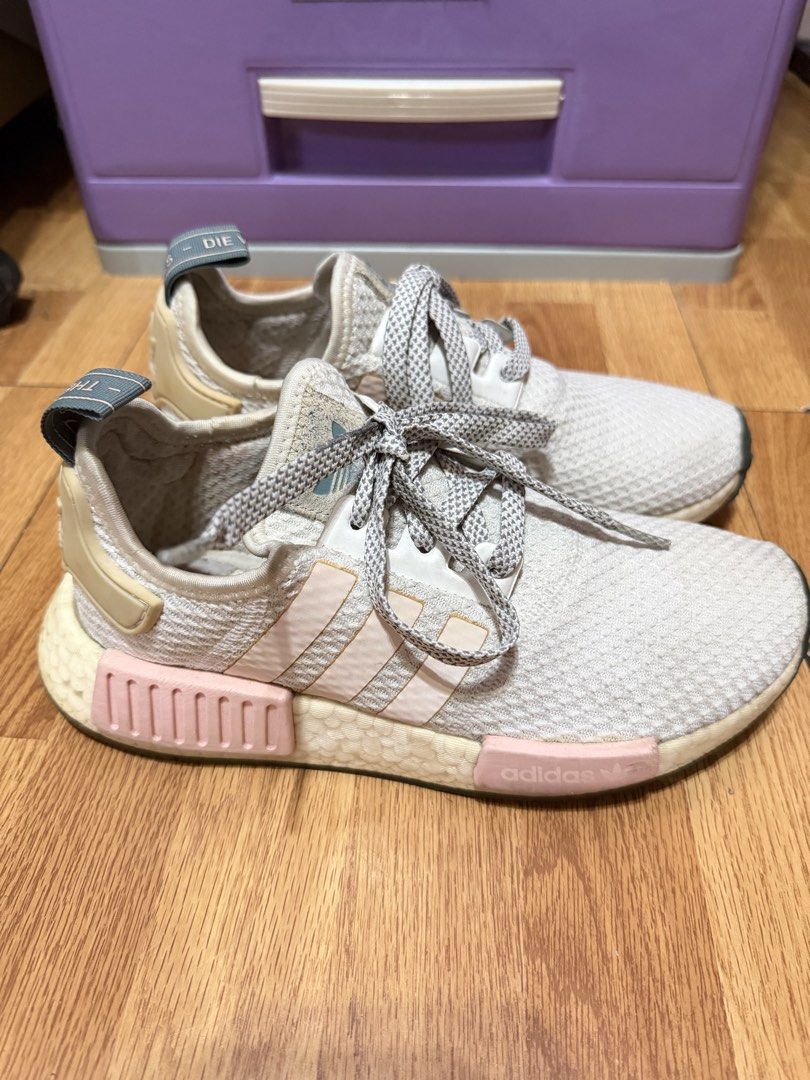 Adidas NMD (Category: Sneakers) located in Las Pinas. Submitted by mabs_treasures (Listing ID 1468766620, Image 1). Description: item is lightly used. a bit yellow on the sole due to being stucked in the cabinet but overall still in good condition.
