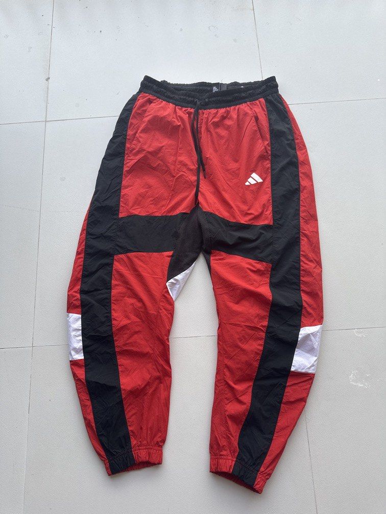 Adidas O-Shape pants - red (Category: Joggers) located in Angeles City. Submitted by royal_vintage_thriftshop (Listing ID 1468778615, Image 1). Description: Adidas O-Shape pants - red w/ drawstring and 3 pockets(1zip at back) Dimensions Size: L on tag Waistline: 30-36 Length: 40 Leg opening: Condition: 9.5/10 As new Issue: No issue.