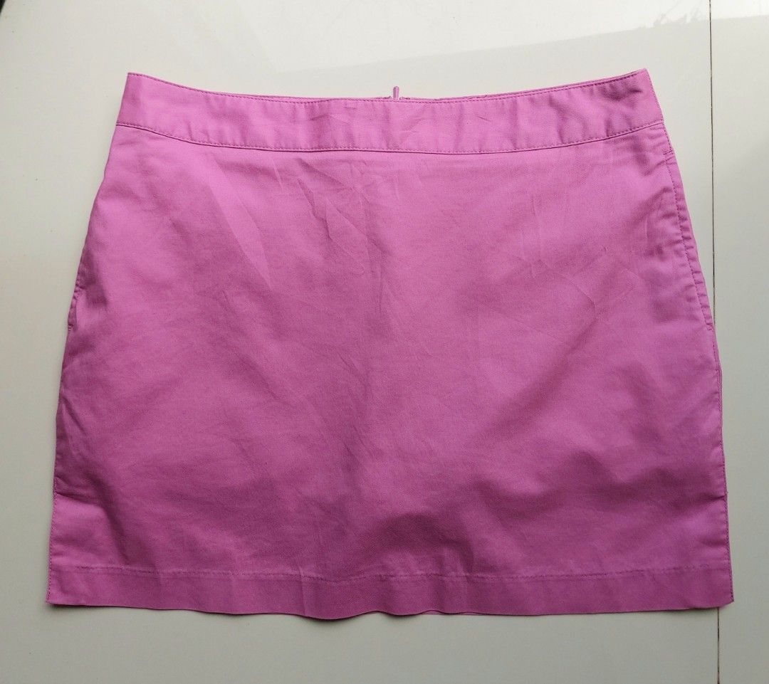Adidas Pink Golf Skort (Category: Skirts) located in Lapu Lapu. Submitted by agnesapm_29813 (Listing ID 1468854777, Image 2). Description: - Brand: Adidas - Color: Bright pink - Size: Large on tag but can fit Medium - Activity: Designed for golf / activewear - Closure: Side zip with smooth YKK hardware - Pocket: Back pocket with button closure and embroidered Adidas logo - With built in shorts inside - Measurements: waist-29 inches, height-14 inc