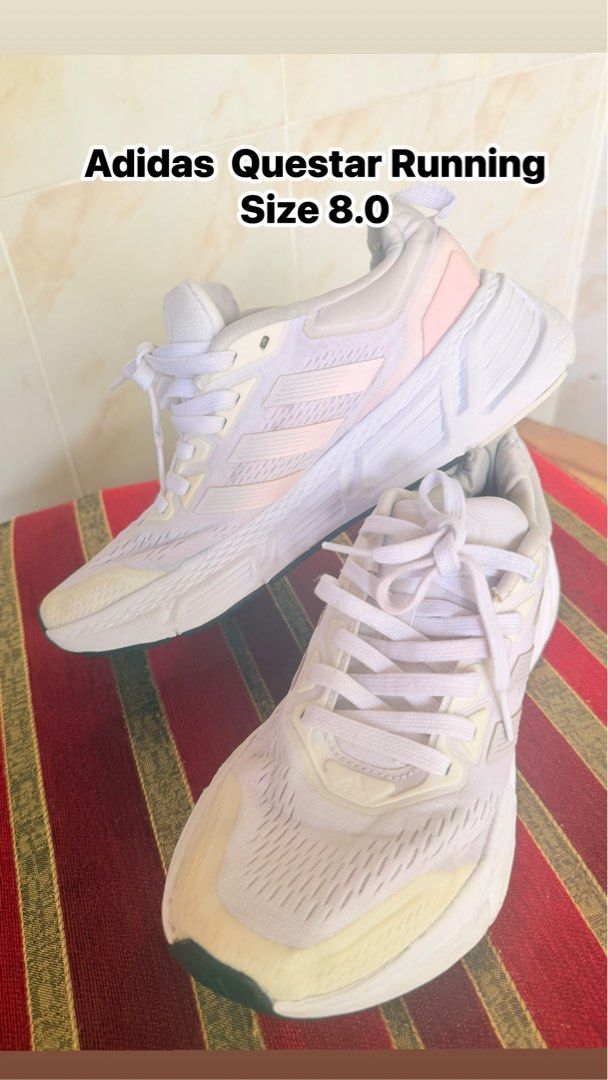 Adidas Questar Running Size 8.0 (Category: Sneakers) located in Manila. Submitted by sedpuprincess (Listing ID 1468783158, Image 1). Description: - Brand: Adidas Questar - Style: Women's running shoes / everyday athletic footwear - Color: White and pink with clean white laces - Size: US Women's 8.0 - Material: Breathable mesh upper - Comfort: Thick cushioned midsole for all-day support during walks or jogs - Design: Classic three-stripes branding
