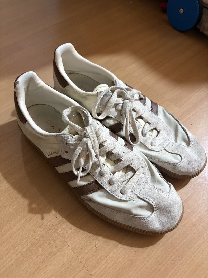 Adidas Samba White Brown Sneakers (Category: Sneakers) located in Manila. Submitted by smmcruz (Listing ID 1468813857, Image 3). Description: - Model: Adidas Samba - Size US 11 - Colorway: White and Brown - Design: Classic low-top with suede toe overlay and gum sole - Details: Lace-up closure with signature gold foil SAMBA lettering - Condition: Normal signs of wear on uppers and insoles from regular use - Style: Versatile streetwear essential th