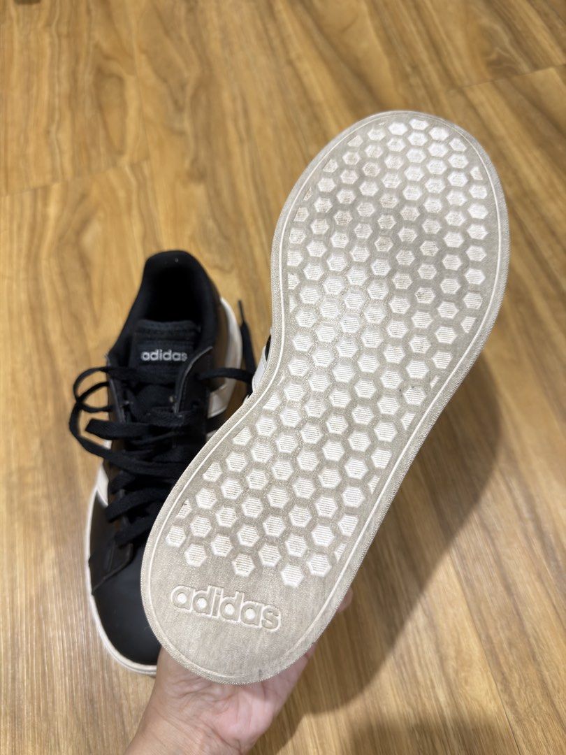Adidas Sneakers (Category: Sneakers) located in Caloocan City. Submitted by MSCloset_ (Listing ID 1468806471, Image 3). Description: - Brand: Adidas - Color: Black and white with black laces - Size: US 7 / UK 5.5 / FR 38 2/3 - Design: Classic three stripes on the side with a hexagon pattern bottom sole - Condition: Clean overall, minimal wear on treads - Origin: Made in India - Style: Great everyday casual shoes.