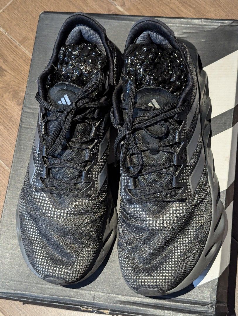 Adidas Switch FWD Black Silver Running Shoes (Category: Sneakers) located in Pasig City. Submitted by imperiumhk (Listing ID 1468751925, Image 2). Description: - Brand: Adidas Switch FWD - Color: Black and Silver - Condition: slightly used - Upper: Breathable mesh with reflective dot patterns - Sole: Distinctive hollow midsole design for superior cushioning and energy return - Fit: Lace-up closure with a padded collar for extra comfort - Details: