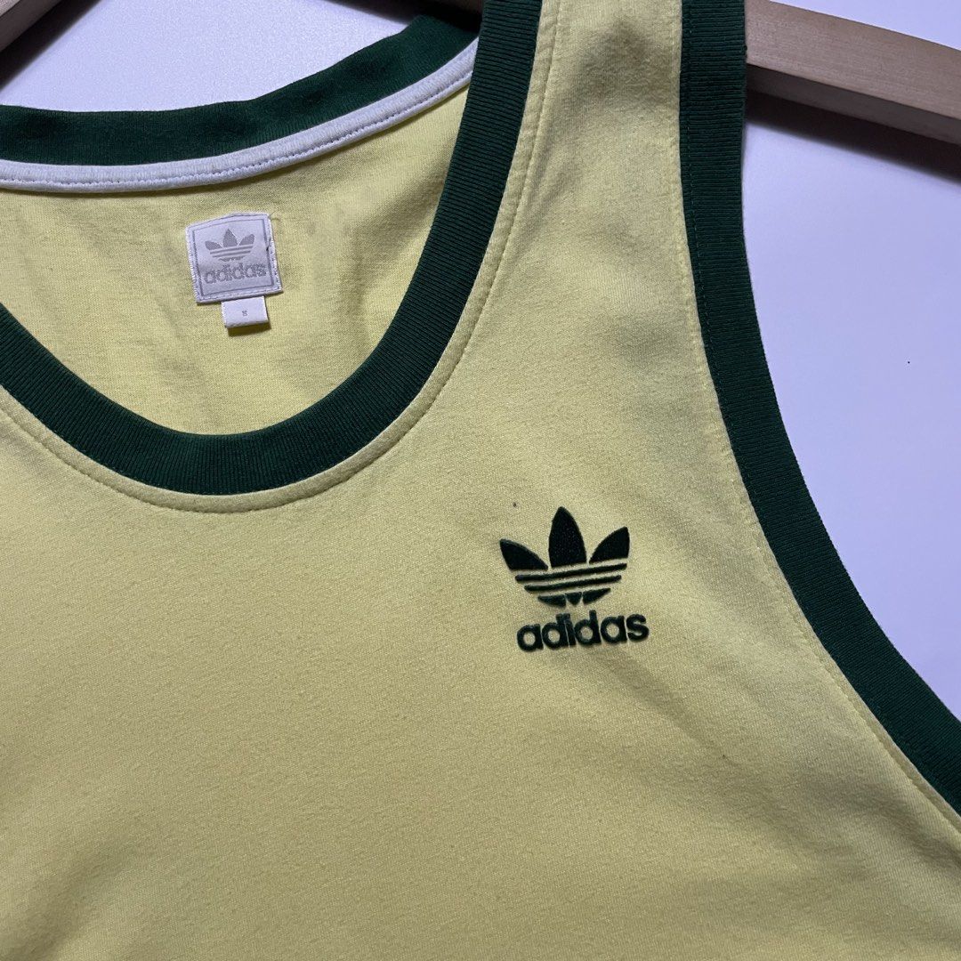 Adidas Tank Top (Category: Tshirts & Polo Shirts ) located in Manila. Submitted by reviveclosetph (Listing ID 1468883748, Image 2). Description: Adidas Tank Top Small / 18 x 28.5 Need wash Excellent Condition 400.