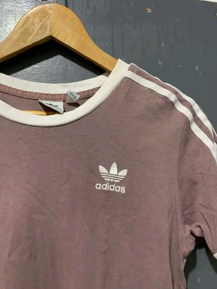 Adidas Tri foil (Category: Tshirts & Polo Shirts ) located in Cagayan de Oro. Submitted by juljoshson (Listing ID 1468855773, Image 2). Description: 18x26 dimensions 9.5/10 color rate excellent condition.