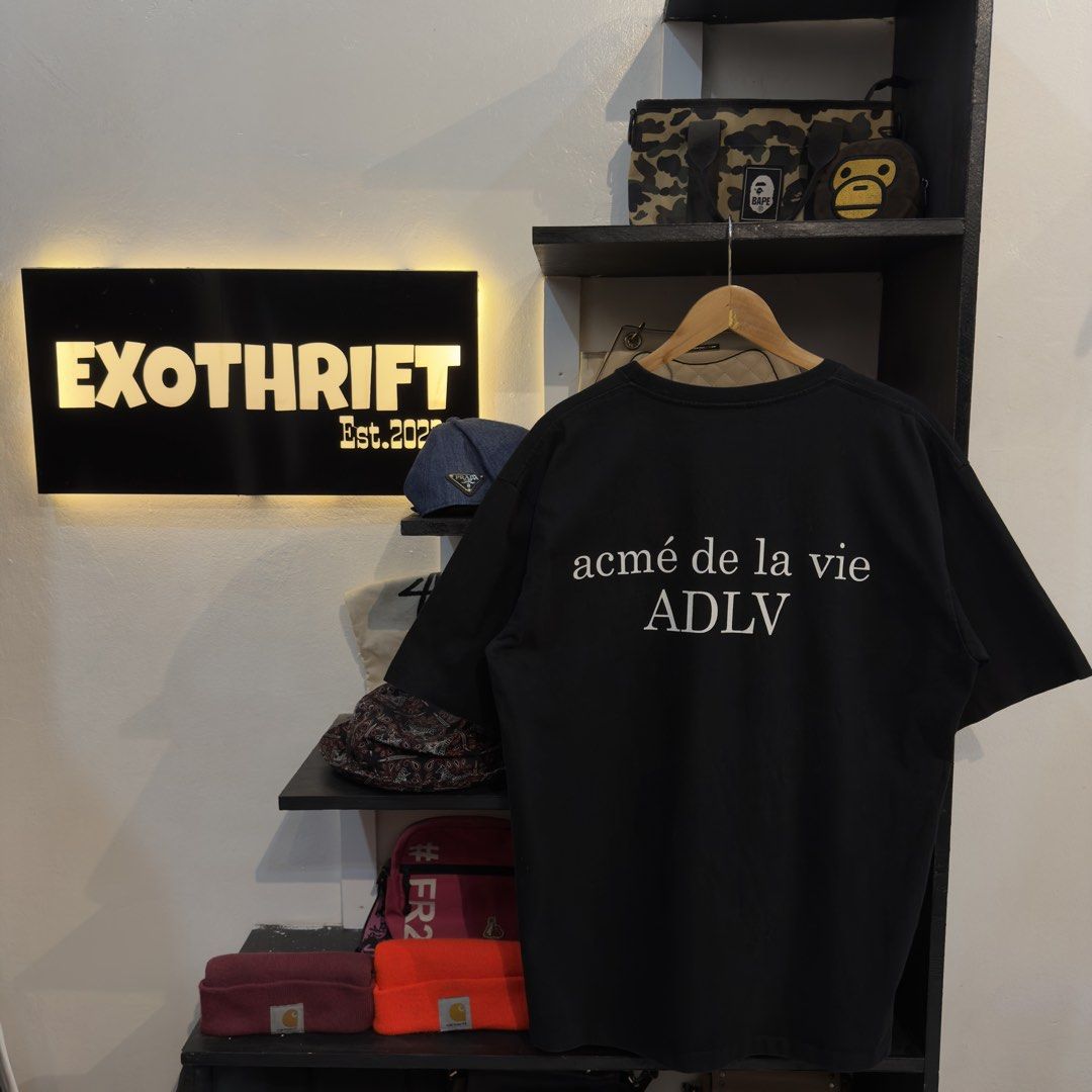 ADLV Black Script Shirt (Category: Tshirts & Polo Shirts ) located in Manila. Submitted by jerichomal82553 (Listing ID 1468906120, Image 1). Description: ADLV Black Script Shirt 23 by 29 Good Condition Complete Tags.