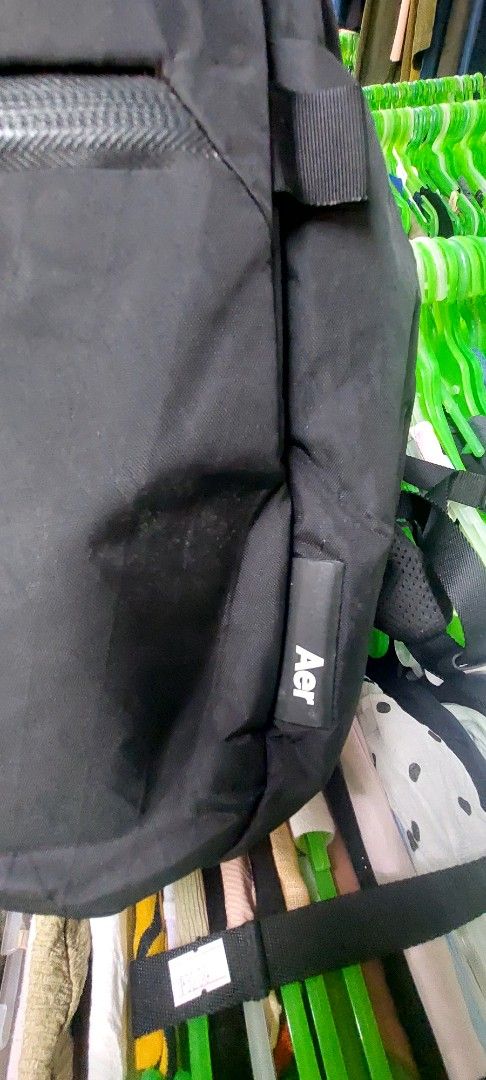 Aer X-Pac Day Pack 3 Black Backpack (Category: Backpacks) located in Puerto Princesa. Submitted by YeSurJOMS (Listing ID 1468851976, Image 2). Description: - Model: Aer Day Pack 3 (X-Pac Edition) - Color: Black with vibrant orange interior lining - Material: Weather-resistant, durable X-Pac fabric - Hardware: Secure and sleek Fidlock buckle hardware - Storage: Convenient vertical front zip pocket - Comfort: Padded mesh shoulder straps for all-day
