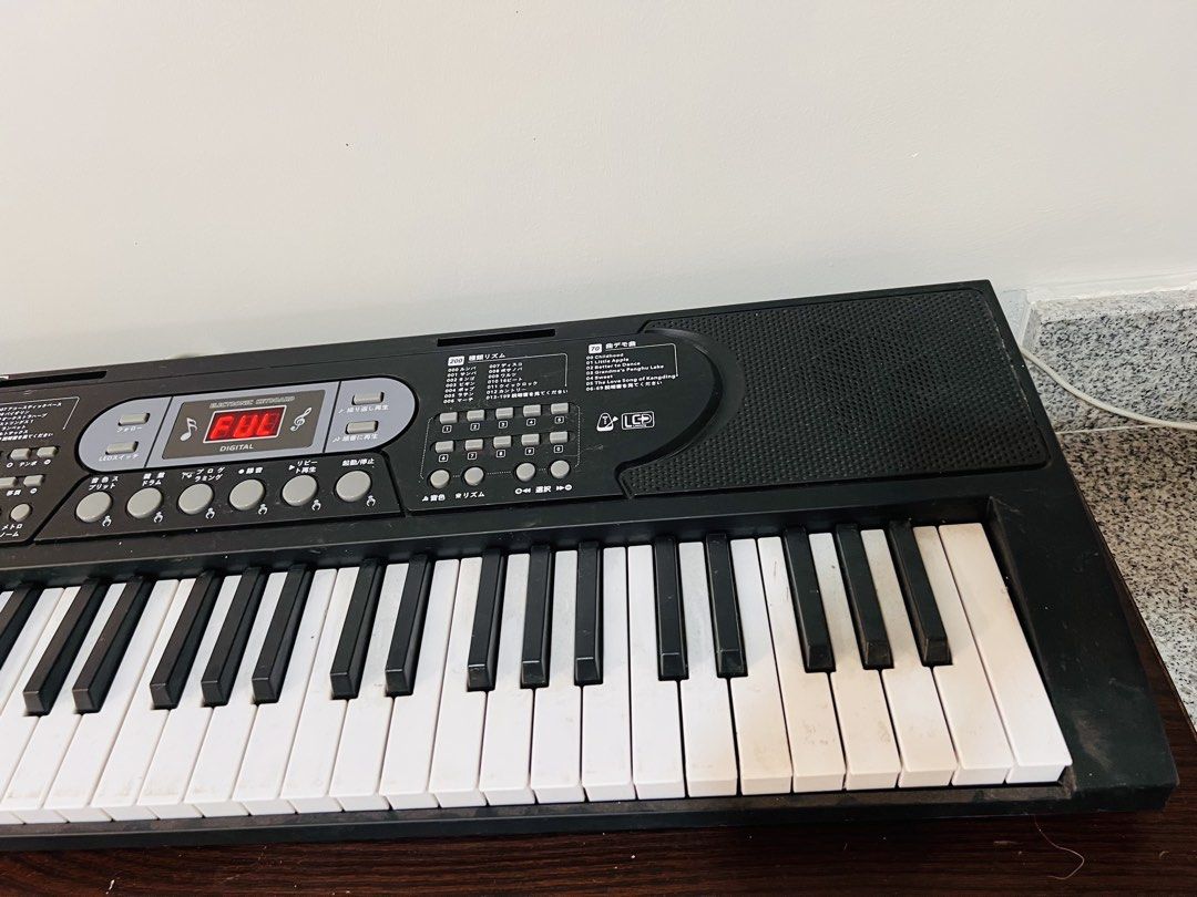 Affordable Hricane 61-Key Electronic Keyboard type C adaptor Issue side body damage (Category: Musical Instruments) located in Malolos. Submitted by afford.japan (Listing ID 1468712973, Image 3). Description: Affordable Hricane 61-Key Electronic Keyboard type C adaptor Issue side body damage.