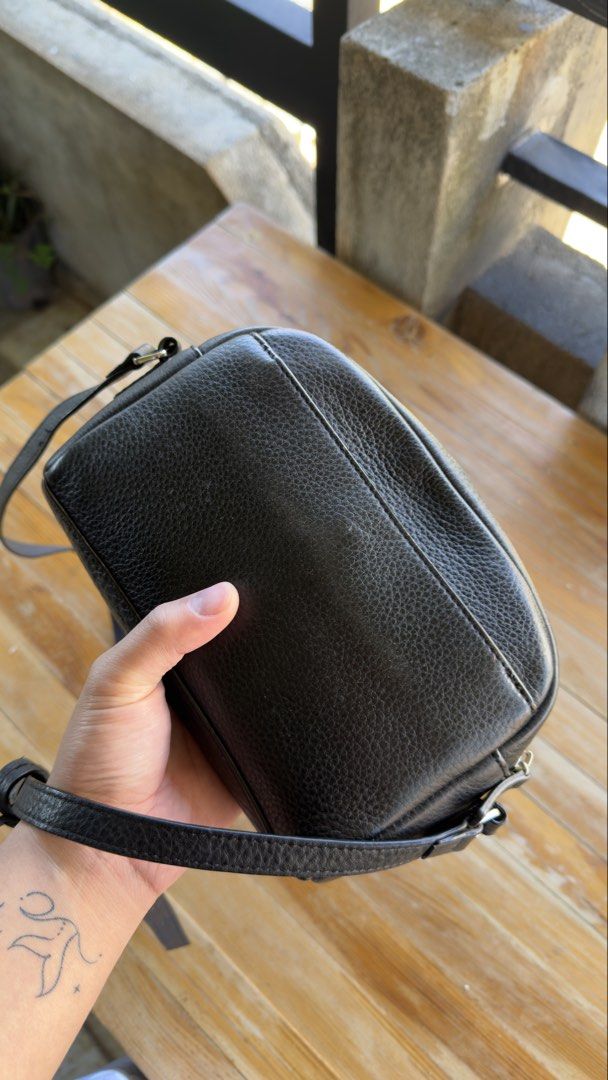 Agnes b. Black Leather Camera Bag Crossbody (Category: Cross-body Bags) located in Baguio. Submitted by fndrskprskid (Listing ID 1468825349, Image 3). Description: - Brand: Agnes b. - Material: Premium black grained leather or pebble leather - Hardware: Silver-toned - Closure: Secure zip top - Strap: Adjustable for a custom fit - Interior: Clean dark lining with a convenient inner zip pocket - Style: Compact and chic, perfect for daily wear Hones