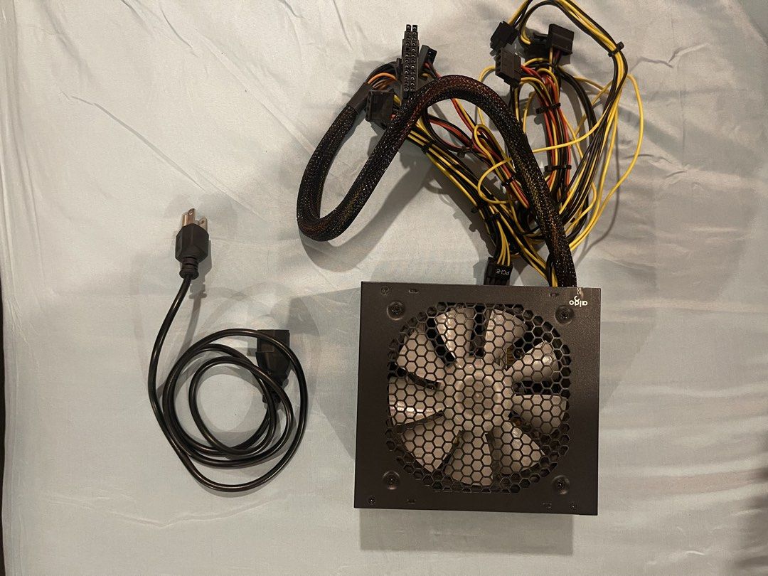 Aigo AK600 PSU (Category: Cables & Adaptors) located in Cainta. Submitted by jiggyrods (Listing ID 1468859088, Image 1). Description: Aigo Warrior AK600 PSU - 600W PSU; good for generic/low wattage PC build - No issue/s with power delivery RFS: Upgrades to new PSU; decluttering Price negotiable.