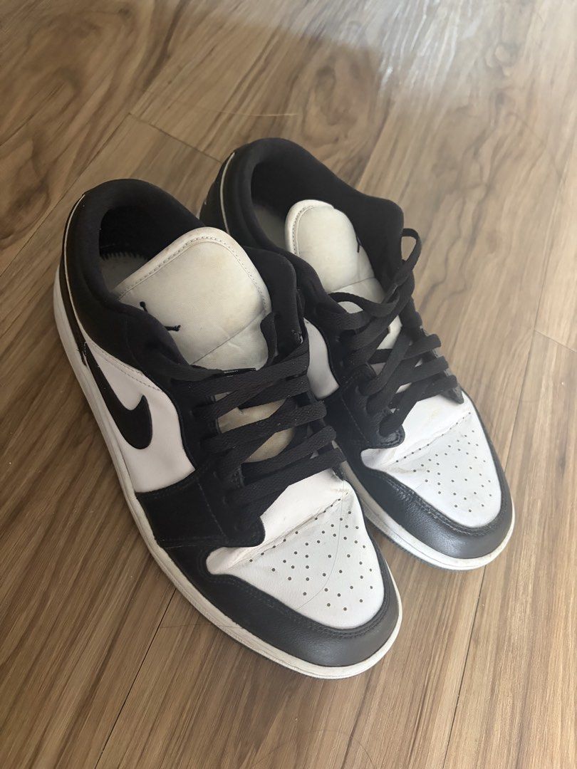Air Jordan 1 Low Panda Size 11 (Category: Sneakers) located in Bacoor. Submitted by quentinz (Listing ID 1468780723, Image 3). Description: - Item: Air Jordan 1 Low - Colorway: Panda (Black and White) - Size: Men's US 11 / UK 8.5 / EUR 43 - Condition: Normal wear on midsoles and minor toe box creasing, plenty of life left - Details: Classic leather upper, iconic Jumpman tongue branding, embroidered Wings heel logo - Perfect daily rotation sneaker
