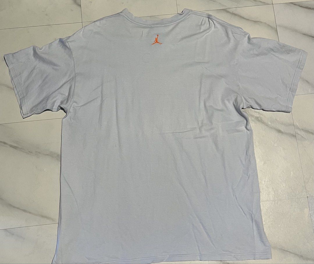 Air Jordan Blue Graphic Tee Size L (Category: Tshirts & Polo Shirts ) located in Cavite. Submitted by christianzuuu (Listing ID 1468786347, Image 2). Description: - Brand: Air Jordan - Color: Light blue - Size: Large (Made in Honduras) - Material: 100% cotton - Design: Front shoe graphic with cursive text and small orange Jumpman logo on upper back - Measurements: Length 29.5" | Width 23" - Condition: Good / Ready to ship - Feel free to send a me