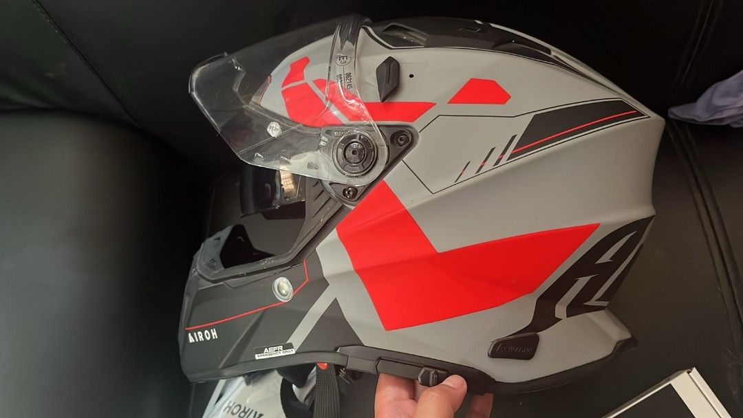 Airoh Commander 2 Helmet Size XL (Category: Coats, Jackets and Outerwear) located in Makati City. Submitted by cess2377 (Listing ID 1468809397, Image 2). Description: - Model: Airoh Commander 2 Adventure Helmet - Color: Grey and Red - Size: XL (59-60 cm) - Shield: Clear shield installed - Inclusions: Original box, manual, visor peak attachment, and accessories bag - Condition: Excellent, great gear upgrade for street and dirt riding - Location: P