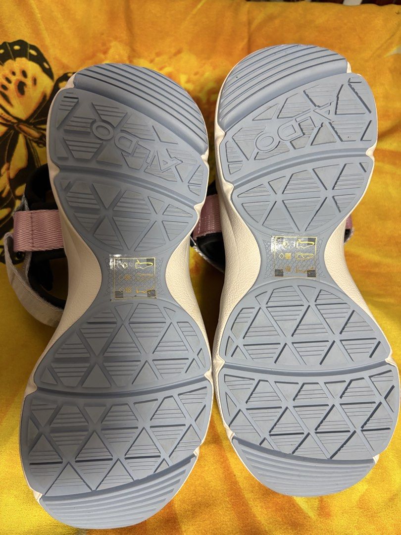 ALDO Platform Sandals Multi-Color Chunky Sole (Category: Sandals) located in Manila. Submitted by nykji96 (Listing ID 1468719948, Image 3). Description: - Brand: ALDO - Style: Platform sandals with chunky soles - Colors: Multi-color straps (silver metallic, pink, and grey webbing) with a black footbed - Closure: Adjustable hook-and-loop ankle straps - Condition: Flaking and wear present on the silver metallic front strap; soles have minor wear wi
