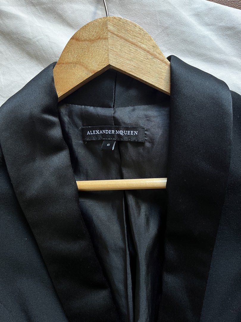 Alexander McQueen Black Blazer Jacket (Category: Coats, Jackets and Outerwear) located in Bulacan. Submitted by handmedownfinds (Listing ID 1468717929, Image 2). Description: - Brand: Alexander McQueen - Size: 6 (Philippine fit guide available upon request) - Color: Classic Black - Material: 100% Cotton - Design: Structured fit, shawl lapel, padded shoulders, and front pocket flaps - Sleeves: Three-quarter length - Closure: Single button front - 