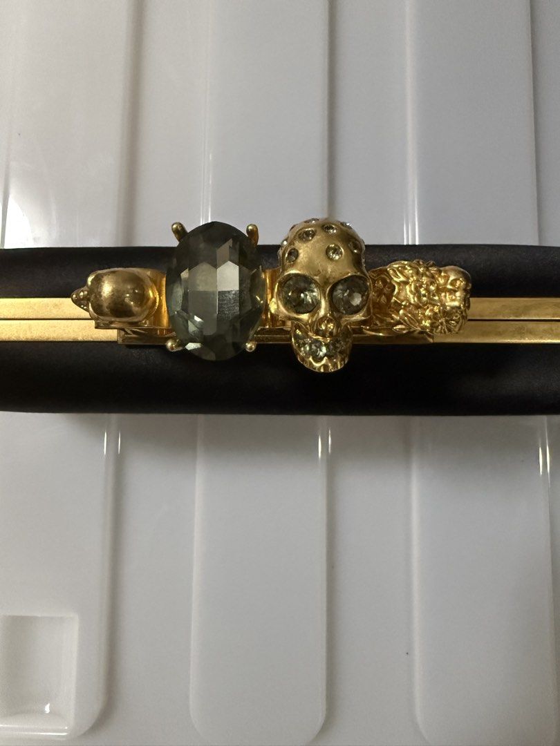 Alexander McQueen Black Satin Knuckle Clutch (Category: Clutches) located in Pasig City. Submitted by danica.agcamaran (Listing ID 1468751503, Image 1). Description: Guaranteed Authentic, no inlucions - as is only..