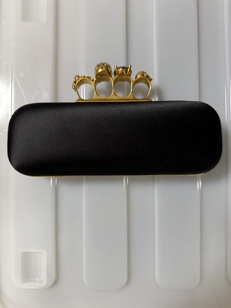Alexander McQueen Black Satin Knuckle Clutch (Category: Clutches) located in Pasig City. Submitted by danica.agcamaran (Listing ID 1468751503, Image 2). Description: Guaranteed Authentic, no inlucions - as is only..
