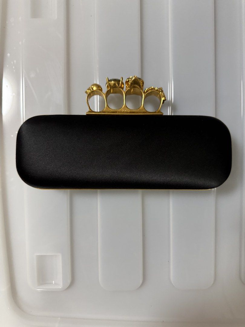 Alexander McQueen Black Satin Knuckle Clutch (Category: Clutches) located in Pasig City. Submitted by danica.agcamaran (Listing ID 1468751503, Image 3). Description: Guaranteed Authentic, no inlucions - as is only..