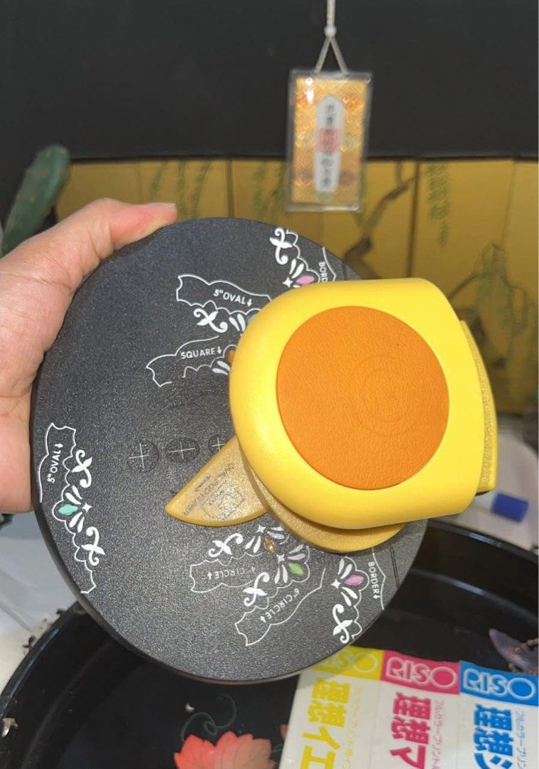 allDeco Punch Multi-Shaper with Base (Category: Craft Supplies & Tools) located in Guiguinto. Submitted by ambershelb75728 (Listing ID 1468798517, Image 1). Description: - Brand: allDeco Multi-Shaper Craft Punch System - Includes: Yellow punch tool and large black alignment base - Features: Creates various shapes and borders (circles, ovals, squares) - Ideal for: Scrapbooking, card making, and DIY paper crafts - Condition: Used with normal signs 