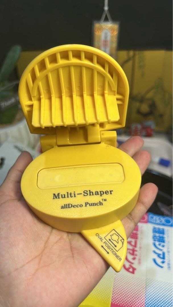 allDeco Punch Multi-Shaper with Base (Category: Craft Supplies & Tools) located in Guiguinto. Submitted by ambershelb75728 (Listing ID 1468798517, Image 3). Description: - Brand: allDeco Multi-Shaper Craft Punch System - Includes: Yellow punch tool and large black alignment base - Features: Creates various shapes and borders (circles, ovals, squares) - Ideal for: Scrapbooking, card making, and DIY paper crafts - Condition: Used with normal signs 