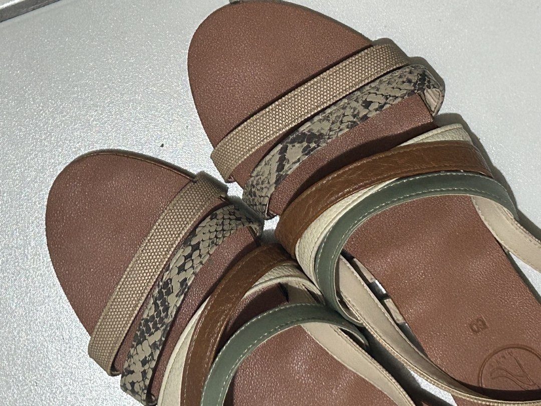 Alts PH Becky Multi-strap casual sandals (Category: Flats & Sandals) located in Davao. Submitted by the23rd_preloved (Listing ID 1468881778, Image 3). Description: - Brand: Alts PH - Model: Becky in Neutral - Style: Multi-strap flat sandals - Colors & Patterns: Brown, tan, green, beige, and snake print - Details: Back ankle strap with buckle closure, comfortable brown footbed with embossed logo stamp - Size: 6 - Condition: Like new, rarely used -