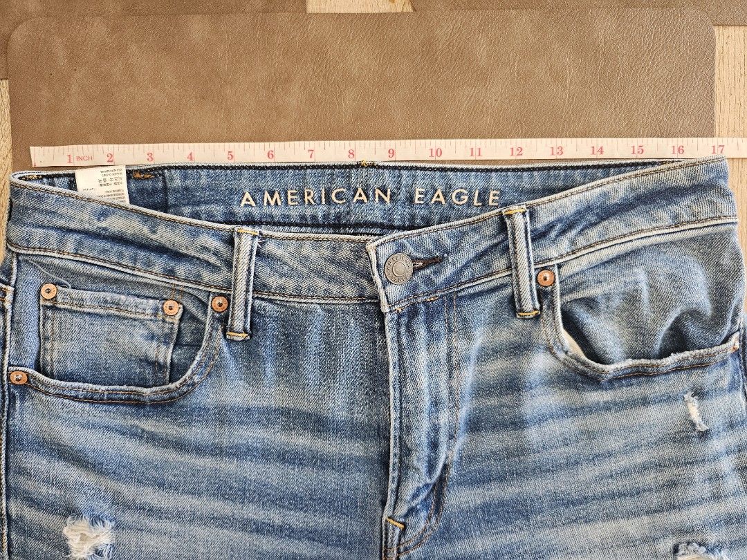 American Eagle AirFlex+ Distressed Denim Jeans (Category: Jeans) located in Cagayan de Oro. Submitted by brucewee (Listing ID 1468793587, Image 3). Description: - Brand: American Eagle - Style: AirFlex+ distressed blue jeans - Details: Ripped details on both legs, whiskering, classic 5-pocket design - Closure: Standard button and zip fly.