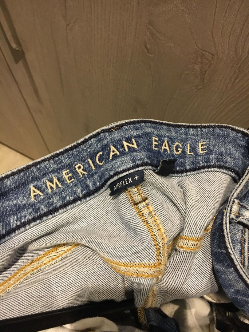 American Eagle Airflex+ Original Straight Jeans 31x32 (Category: Jeans) located in Manila. Submitted by grnickkk (Listing ID 1468758481, Image 2). Description: - Brand: American Eagle - Style: Original Straight Jeans - Size: 31 x 32 - Color: Blue with standard wash and slight fading at the knees - Material: Airflex+ stretch denim (cotton, polyester, and lyocell blend) - Features: Regular button closure, zip fly, and classic five-pocket design - C