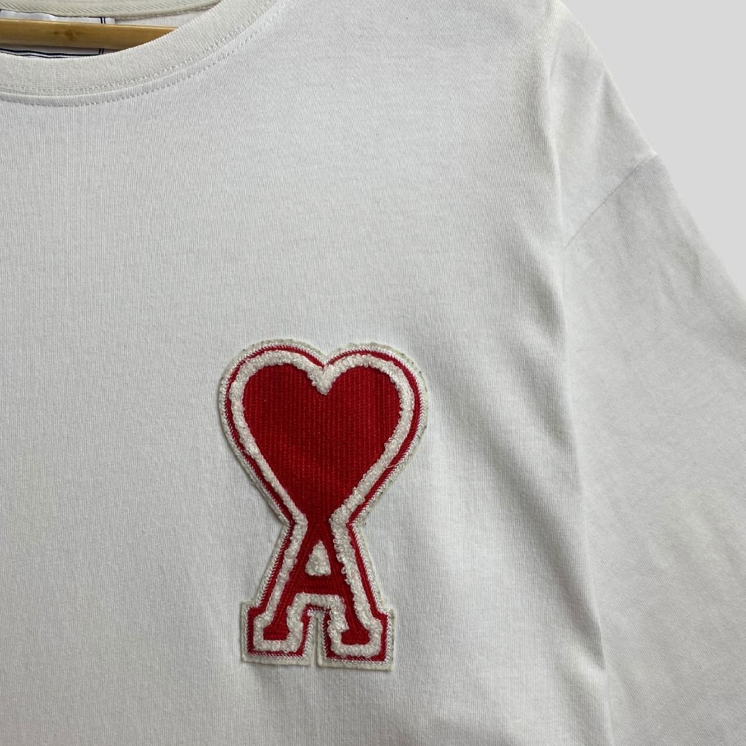 AMI BIG LOGO WHITE TSHIRT (Category: Tshirts & Polo Shirts ) located in La Trinidad. Submitted by suave.arc (Listing ID 1468847924, Image 2). Description: AMI BIG LOGO WHITE TSHIRT EXCELLENT CONDITION SIZE: XL ( 22x29 ) LOCATION: BAGUIO CITY / LA TRINIDAD.