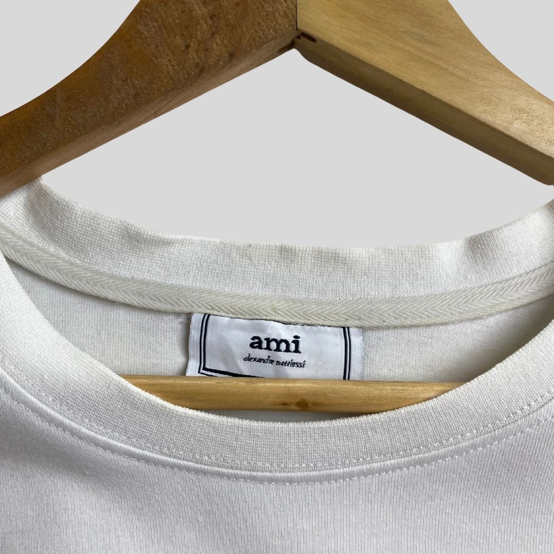 AMI BIG LOGO WHITE TSHIRT (Category: Tshirts & Polo Shirts ) located in La Trinidad. Submitted by suave.arc (Listing ID 1468847924, Image 3). Description: AMI BIG LOGO WHITE TSHIRT EXCELLENT CONDITION SIZE: XL ( 22x29 ) LOCATION: BAGUIO CITY / LA TRINIDAD.