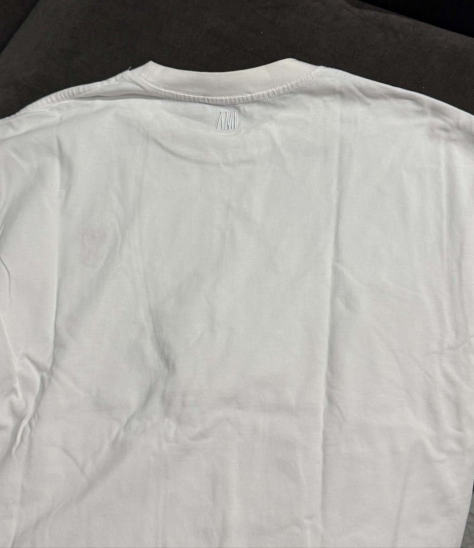 AMI T-Shirt (Category: Formal Shirts) located in Marikina City. Submitted by thevelvetcat (Listing ID 1468882215, Image 2). Description: Color: White Fits L to XL.