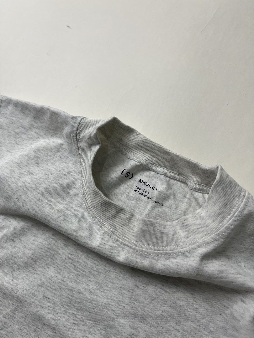 Amulet Tank Top (Category: Tshirts & Polo Shirts ) located in Makati City. Submitted by ufcknwthbst (Listing ID 1468732827, Image 3). Description: 21 inch width 27 inch length 9.5/10 condition No issue.