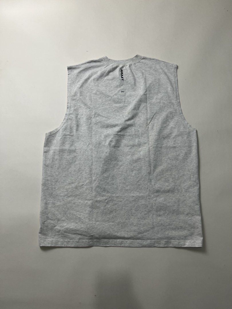 Amulet Tank Top (Category: Tshirts & Polo Shirts ) located in Makati City. Submitted by ufcknwthbst (Listing ID 1468732827, Image 2). Description: 21 inch width 27 inch length 9.5/10 condition No issue.